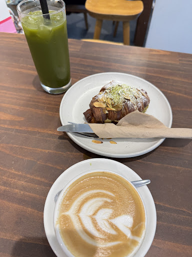 Matcha and pastry served at Kompass Coffee
